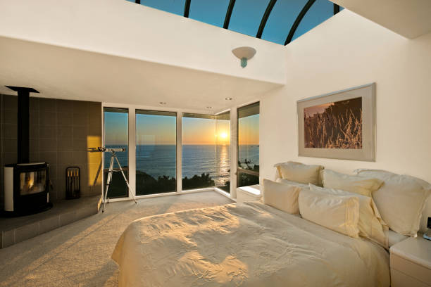 istock Architecture: Bedroom at sunset by ocean in California 1172128517