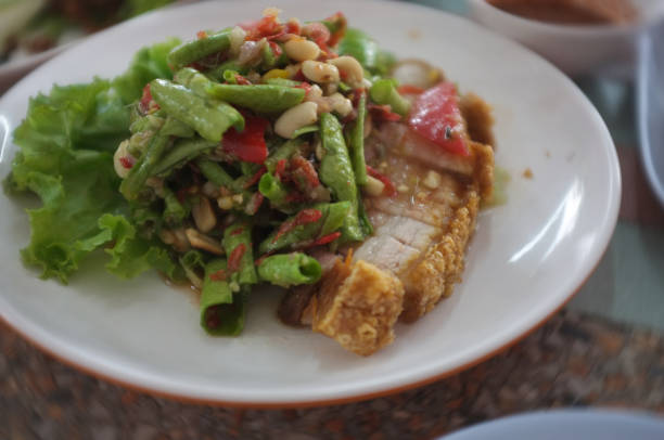 istock Crispy pork papaya salad mixed , Thai food 1172131309