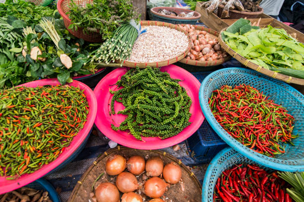 green peper and chili at the food market in the city of  Phrae in the north of Thailand.  Thailand, Phrae November, 2018.