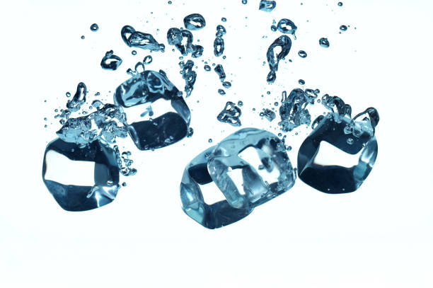 istock Group of ice cubes falling in water 1172131608
