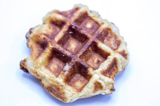 istock Close up Caramel waffles dessert isolate on white background. 1172133103