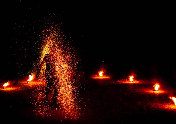 istock Firestarter performing amazing fire show at Koh Samed Samet island Thailand 1172138599