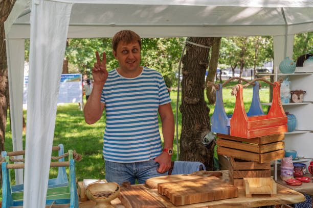istock Funny carpenter with his products 1172140557