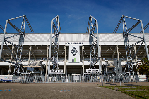 Moenchengladbach, Germany - August 30, 2019: East entrance of the soccer stadium Borussia Park. It is build in 2004 and has a capacity of more than 54.000 people and it is the home stadium of german Bundesliga club Borussia Moenchengladbach.