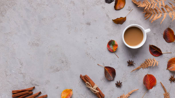 istock Hot Coffee in cup on background with fallen bright leaves 1172141981