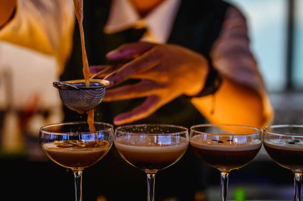 istock Bartender making alcoholic cocktail at the bar. 1172143137