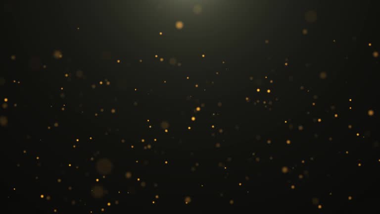 4k resolution Christmas Background, Defocused Gold Colored Particles on black Background,Slowly falling Gold bokeh, glitter lights Background, party-social events Background, celebration events Background, birthday events Background,Happy new Year Background