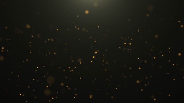 4k resolution Christmas Background, Defocused Gold Colored Particles on black Background,Slowly falling Gold bokeh, glitter lights Background, party-social events Background, celebration events Background, birthday events Background,Happy new Year Background