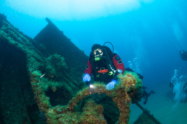 istock Technical Diving Scuba diver used Closed Circuit Rebreather  Exploring and enjoying Wreck diving over a shipwreck Sea life  Water sports Techdive Scuba diver point of view 1172143442