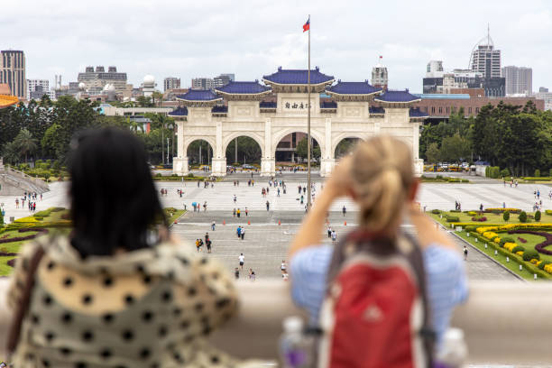 People looking at the Liberty Square Arch,Taipei,Taiwan, Aug 24,2019 Aug 24,2019 People looking at the Liberty Square Arch from the monument National Chiang Kai-shek Memorial Hall,Taipei,Taiwan chiang kai shek photos stock pictures, royalty-free photos & images