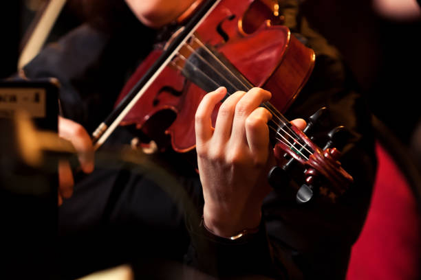 istock Hand girl playing the violin 1172153068