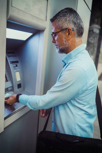 istock Cash withdrawal 1172153822