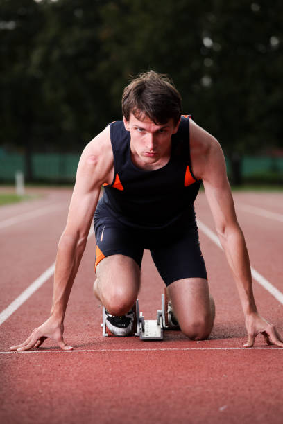 awal lomba 100m - lari 100 meter foto potret stok, foto, & gambar bebas royalti