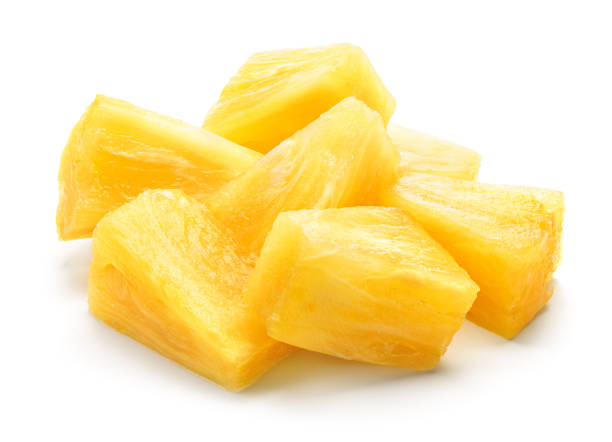 istock Canned pineapple chunks. Pineapple slices isolated. Pineapple pieces on white background. 1172156886