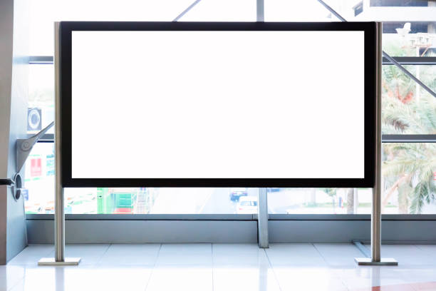 istock Advertisement mockup. Blank empty billboard inside a shopping mall or metro underground in Dubai, UAE. 1172158622
