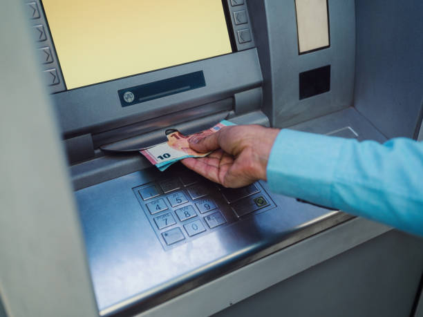 istock Cash withdrawal 1172159450