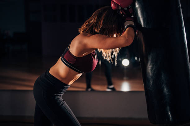 istock Young lady is tired of boxing 1172159763