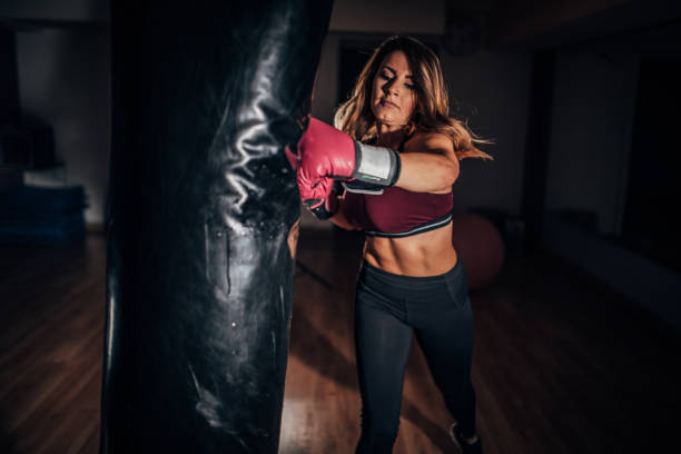 istock Fit woman training boxing 1172159836