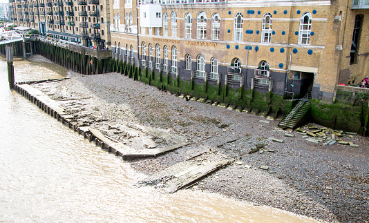 August 21, 2019 – The River Thames, London, United Kingdom. A small section of riverbed is shown at the side of the River Thames, in London, UK.