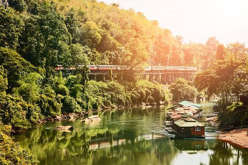The train on the Bridge over the River Kwai at Kanchanaburi, Thailand. The Bridge on the River Kwai was built during World War 2.