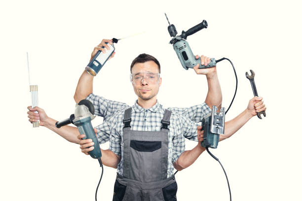 Funny portrait of a craftsman with 6 arms - isolated on white Photo montage of an artisan holding six different tools in his six arms. Isolated on a white background. Funny competent expression. caricature photos stock pictures, royalty-free photos & images