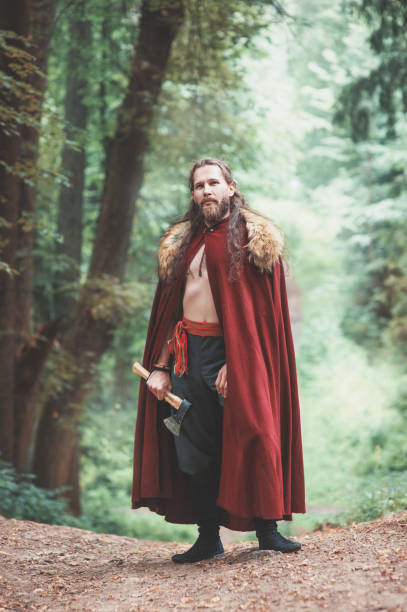 istock Warrior Viking man with iron axe standing 1172164450