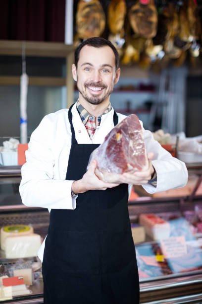 istock Seller offering piece of meat 1172165376