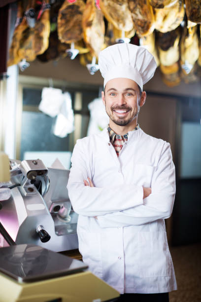 istock Seller offering displayed sorts of meat 1172165379