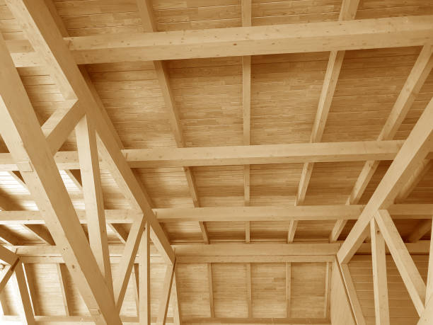 istock The construction of a wooden roof. 1172166459