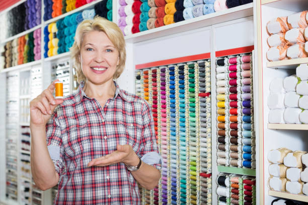istock Portrait of woman with spool 1172166809