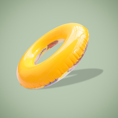 Yellow color swim rings isolated on beautiful pastel color background, with clipping path.