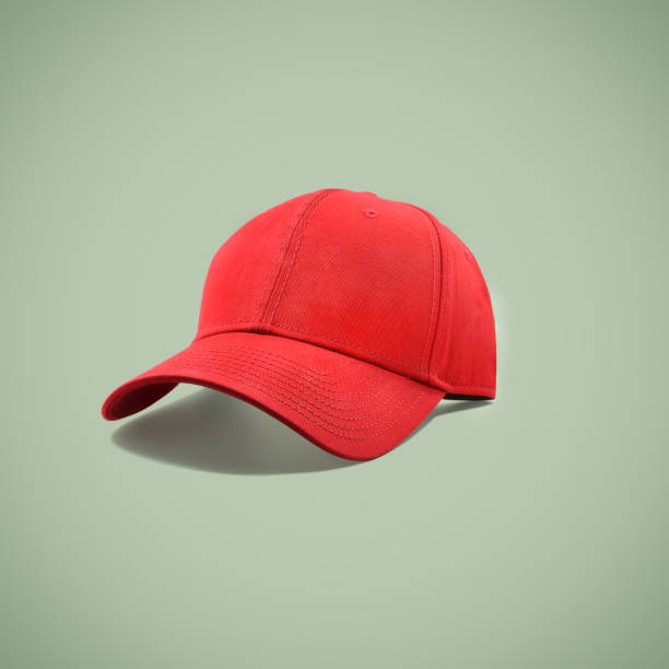 forme e ostenta o tampão vermelho isolado - baseball cap cap isolated nobody - fotografias e filmes do acervo