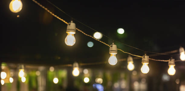 istock party string lights hanging over outdoor restaurant terrace 1172174183