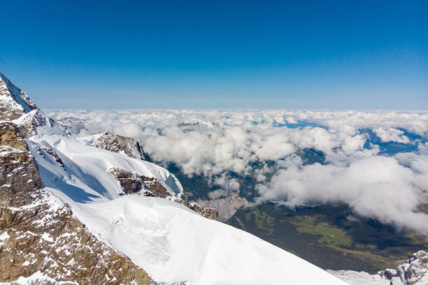 istock Above the cloud on Swiss alps mountain view with drone 1172175109