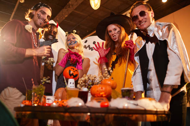 istock Young People Having Fun at Halloween Party 1172176560