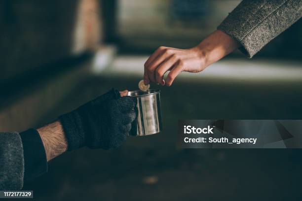 A Helping Hand Stock Photo - Download Image Now - Begging - Social Issue, Beggar, Homelessness