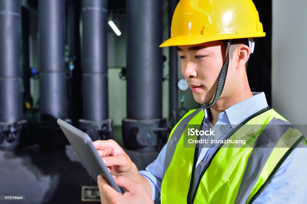 Engineer Done Engineer Working At Pipeline Workshop Stock Photo - Download Image Now ...