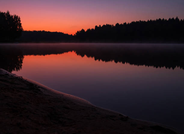 istock early morning sunrise over a lake 1172178792
