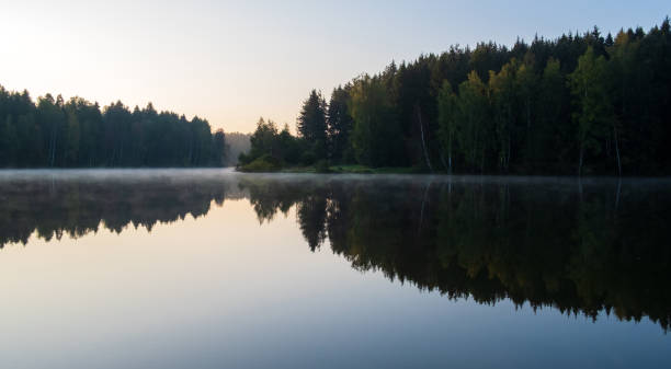 istock early morning sunrise over a lake 1172178837