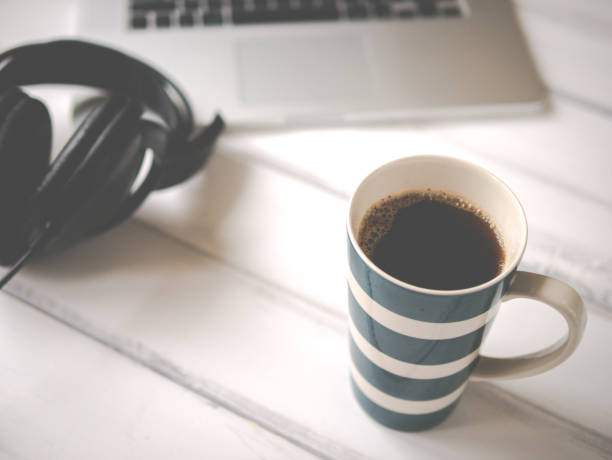 istock Desk with laptop and large mug of coffee 1172180796