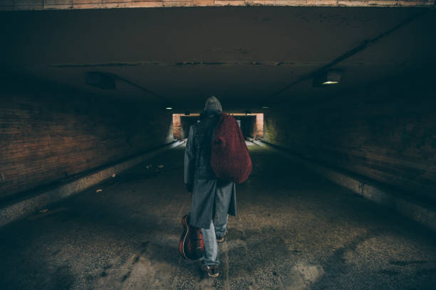 istock Homeless guy walking away 1172183015