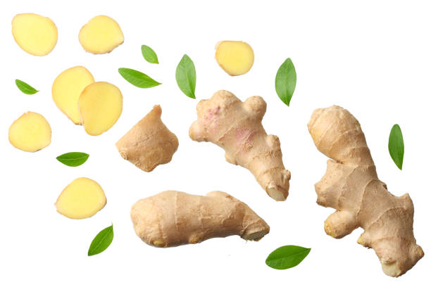 istock sliced ginger with leaves isolated on white background top view 1172183446