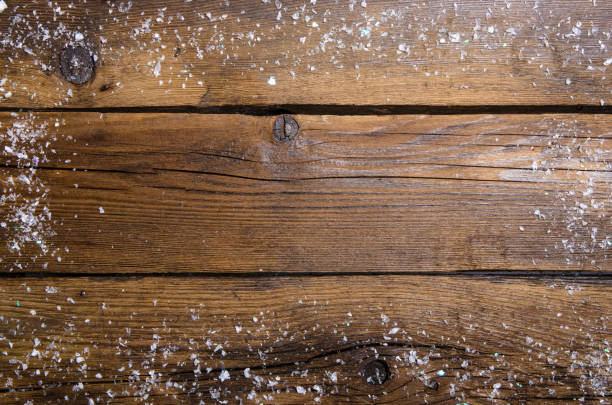 istock Frame made of snow on wooden background 1172186412