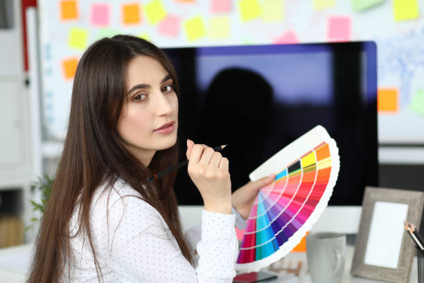 istock Cute lady holding colorful palette 1172188420