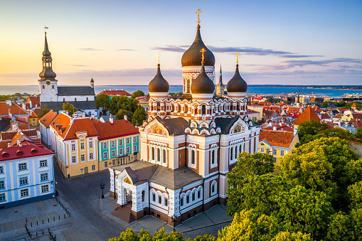aerial view of Alexander Nevsky cathedral and St Mary's Cathedral at sunset in Tallinn, Estonia