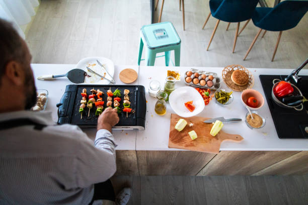 istock Making skewers with meat and vegetables at home 1172194056