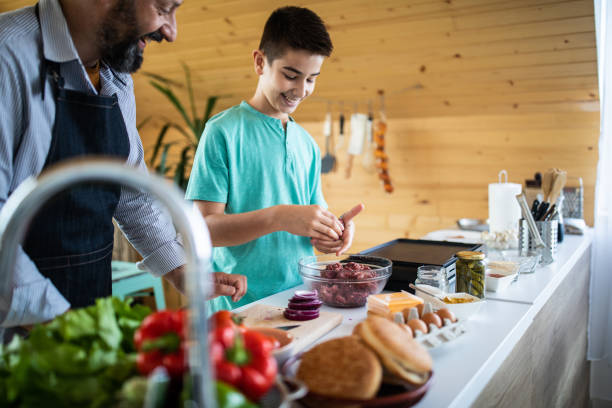 istock Like father like son in the kitchen 1172194221
