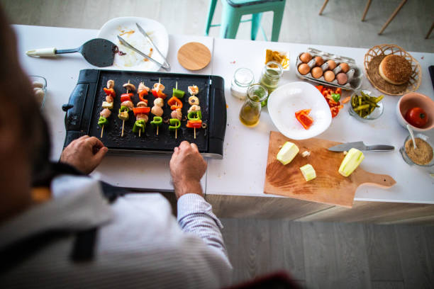 istock Making skewers with meat and vegetables at home 1172194242