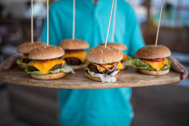 istock Yummy slider-burgers on plate 1172194417