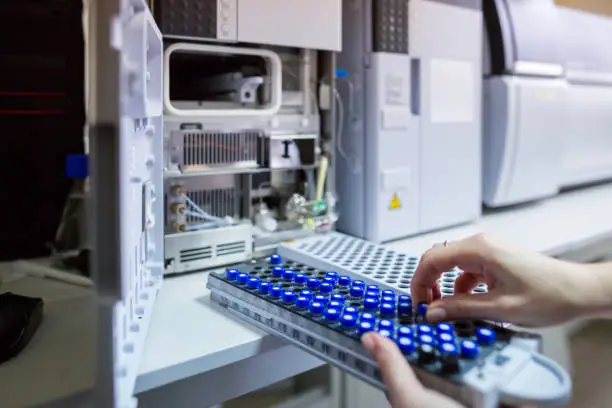 Photo of The laboratory scientist prepares samples for download to High-performance Liquid Chromatograph Mass Spectrometr.